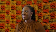 Senegalese director Angele Diabang, poses for a portrait at her apartment in Dakar, on September 5, 2025. (Photo by Carmen Abd Ali / AFP)
 