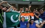Pakistan and India fans cheer before the start of the Asia Cup 2025 Twenty20 international cricket match between India and Pakistan at the Dubai International Stadium in Dubai on September 14, 2025. (Photo by Fadel Senna / AFP)