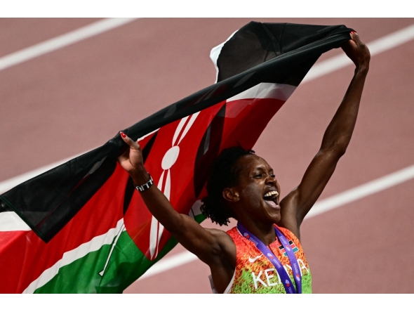 Kenya's Faith Kipyegon celebrates after winning the women's 1500m final during the World Athletics Championships in Tokyo on September 16, 2025. (Photo by Yuichi YAMAZAKI / AFP)
