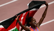 Kenya's Faith Kipyegon celebrates after winning the women's 1500m final during the World Athletics Championships in Tokyo on September 16, 2025. (Photo by Yuichi YAMAZAKI / AFP)
