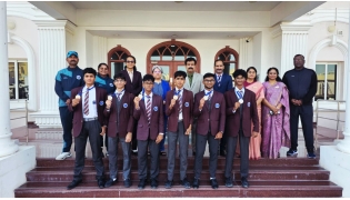 Medal winners with school officials.