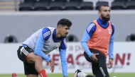 Al Shamal’s Baghdad Bounedjah (left) and Naim Sliti attend team’s training session.  