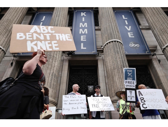 Demonstrators protest the suspension of the 