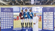 Vice Chairman of the Longines Hathab Organising Committee Ali Al Rumaihi with the podium winners of Gold Tour.