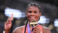 Gold medallist Kenya's athlete Lilian Odira celebrates after winning the women's 800m final during the World Athletics Championships in Tokyo on September 21, 2025. (Photo by Kirill Kudryavtsev / AFP)