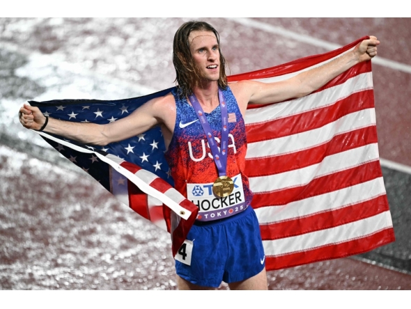 US' athlete Cole Hocker celebrates winning the men's 5000m final during the World Athletics Championships in Tokyo. (Photo by Philip Fong / AFP)