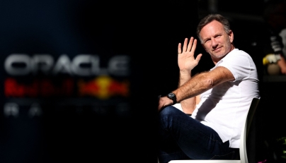 Red Bull Racing team principal Christian Horner waves at the Albert Park Circuit ahead of the Formula One Australian Grand Prix in Melbourne on March 21, 2024. Photo by Martin KEEP / AFP

