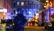 Police officer is seen in Pilestredet just off Parkveien in Oslo, Norway on September 23, 2025, after reports of an explosion. (Photo by Terje Pedersen / NTB / AFP) 