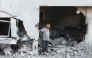 A Palestinian man reacts as he checks the rubble of a building hit by an Israeli strike in the Nuseirat refugee camp in the central Gaza Strip, on September 25, 2025, as Israel presses its air and ground offensive. (Photo by Eyad BABA / AFP)
