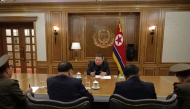 This picture taken on September 26, 2025 and released from North Korea's official Korean Central News Agency (KCNA) on September 27, 2025 shows North Korean leader Kim Jong Un attending a consultation meeting on nuclear materials, at an undisclosed location in North Korea. (Photo by KCNA VIA KNS / AFP)