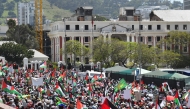 Protesters gather at the South African Parliament during civil society and faith-based organizations’ mass rally for Gaza, in Cape Town on September 27, 2025. (Photo by RODGER BOSCH / AFP)