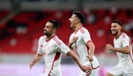 Al Shamal’s Omid Ebrahimi (left) celebrates his equaliser with teammates Baghdad Bounedjah (centre) and Mohamed Naceur Manai.