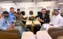 According to AFP, this handout picture released by Qatar's Ministry of Foreign Affairs (MoFA) shows Amir Amiri (left), along with US and Qatar officials. The group was onboard an aircraft following Amiri's release from detention in Kabul, Afghanistan. (Photo by AFP through MoFA handout)




