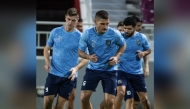 Al Duhail's Marco Verratti (centre) trains with teammates.