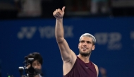 Spain's Carlos Alcaraz reacts after his men痴 singles match against Norway's Casper Ruud at the ATP Japan Open tennis tournament in Tokyo on September 29, 2025. (Photo by Philip FONG / AFP)