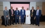 HSBC Qatar officials pose for a group photo during the event.