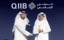 NCSA President Eng. Abdul Rahman Ali Muhammad Al-Farahid Al-Malki presenting the NIA certification to QIIB Chief Executive Officer, Dr. Abdulbasit Ahmad al-Shaibei.