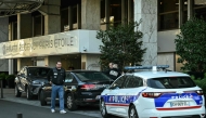 Members of the Judiciary Police arrive at the Hyatt Regency Paris Etoile Hotel at Porte Maillot in Paris, after South Africa's ambassador to France was found dead at the foot of the hotel on September 30, 2025. Photo by Anna KURTH / AFP