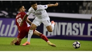 Al Sadd's Paulo Otavio (right) battles for the ball with a Sharjah FC player.