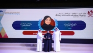 MoEHE Undersecretary H E Dr. Ibrahim bin Saleh Al-Nuaimi and NCSA President H E Eng Abdulrahman Ali Muhammad Al Farahid Al Malki honouring Assistant Undersecretary for Educational Affairs Maha Zayed Qaqaa Al Ruwaili.