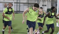 Al Kharaitiyat players take part in a training session.