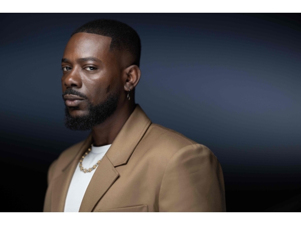 (Files) Nigerian Afrobeat singer and songwriter Adekunle Almoruf Kosoko poses during a photo session in Paris on September 9, 2025. (Photo by Joel Saget / AFP)

