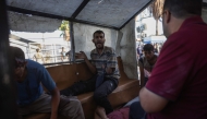 Palestinians transport casualties of a reported Israeli drone attack in Deir al-Balah, to Al-Aqsa Martyrs Hospital in the central Gaza Strip on October 2, 2025. (Photo by BASHAR TALEB / AFP)
