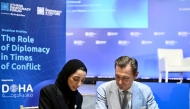 President of the Athens Democracy Forum, Achilles Tsaltas; and General Manager of Doha Forum, Maha Al Kuwari signing a new partnership agreement. 