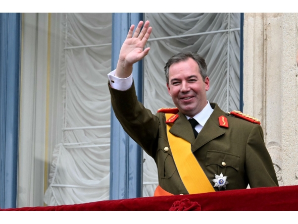 Luxembourg's Grand Duke Guillaume waves from the balcony of the Grand Ducal Palace after being sworn-in as Grand Duke Head of State of Luxembourg in Luxembourg city on October 3, 2025. Photo by NICOLAS TUCAT / AFP