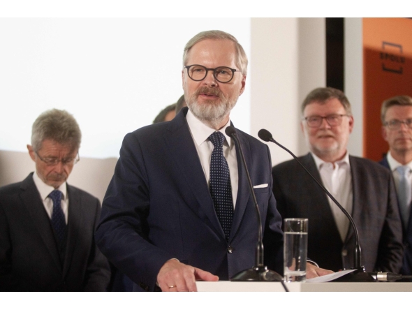 Petr Fiala, Czech Prime Minster and Leader of Czech Republic's Civic Party (ODS) and Together (SPOLU) coalition speaks at the coalition headquarters in Prague on October 4, 2025 after the parliamentary elections.  (Photo by MILAN KAMMERMAYER / AFP)