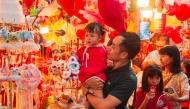 People shop for the Mid-Autumn Festival at Hang Ma Street in Hanoi, Vietnam, Oct. 3, 2025. Hanoi's Hang Ma Street is brightly decorated with lanterns and festive items for the upcoming Mid-Autumn Festival. (Photo by Dang Hong Dung/Xinhua)