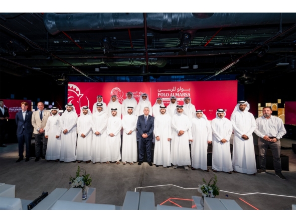 Officials pose for a photograph following a press conference held in connection with the launch of Polo AlMarsa Qatar, the country’s first ever polo showcase.
