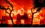 File. Representational: A home is engulfed in flames during the Eaton fire in the Altadena area of Los Angeles County, California on January 8, 2025. (Photo by Josh Edelson / AFP)