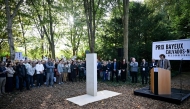 French General Director of RSF Thibault Bruttin addresses the audience during a ceremony next to the 2024-2025 memorial paying tribute to the 73 journalists killed around the world while doing their job during the past year, as part of the 2025 edition of the “Prix Bayeux Calvados-Normandie of the war correspondants”, in Bayeux, northwestern France, on October 9, 2025. (Photo by Lou BENOIST / AFP)