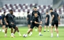 Qatar players take part in a training session. 