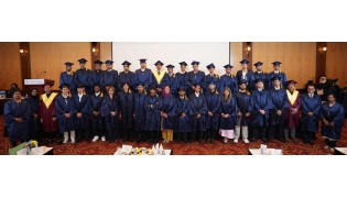  Students and school officials at the ceremony.