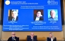 (L-R) John Hassler, Chair of the Committee for the Prize in Economic Science in Memory of Alfred Nobel, the Secretary General of the Royal Swedish Academy of Sciences Hans Ellegren and Kerstin Enflo, member of the Committee for the Prize in Economic Sciences in Memory of Alfred Nobel sit in front of a screen displaying the portraits of the 2025 prize winners. (Photo by Anders Wiklund / TT NEWS AGENCY / AFP) 