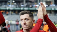 Poland's forward #09 Robert Lewandowski celebrates after the 2026 World Cup qualifiers Europe zone group G football match between Lithuania and Poland on October 12, 2025 in Kaunas, Lithuania. (Photo by Petras Malukas / AFP)
