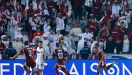 Qatar's defender #2 Pedro Miguel celebrates scoring his team's second goal during the FIFA World Cup 2026 Asian qualifier football match between Qatar and the UAE at Jassim Bin Hamad Stadium in Doha on October 14, 2025. (Photo by Karim Jaafar / AFP)