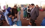  A student explaining his project to officials.