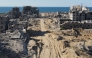 An aerial view shows the Al-Maqussi Towers district, heavily damaged by massive Israeli bombardment over the past two years, in northwestern Gaza City on October 15, 2025 (Photo by AFP)
