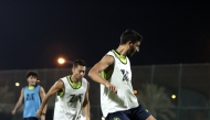 Al Kharaitiyat players in action during a training session yesterday.