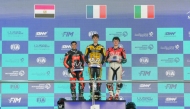 QSSP 300 Race 2 podium winners celebrate on the podium.