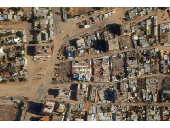 This handout satellite photo obtained from Planet Labs PBC and taken on March 12, 2025 shows the Hagar Qadu Souk (market) in al-Fasher, the capital of Sudan's North Darfur state. (Photo by Planet Labs PBC / AFP)
