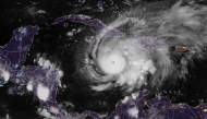 The RAMMB/CIRA satellite image shows hurricane Melissa southeast of Jamaica. Hurricane Melissa was cutting a deadly path in the Caribbean on the night of October 25. Photo by RAMMB/CIRA / AFP