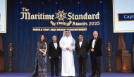 Chief Executive Officer of Mwani Qatar Capt Abdulla Mohamed Al Khanji (third right) during the award ceremony in Dubai. 