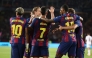 Barcelona's Spanish forward #07 Ferran Torres (C) celebrates with teammates after scoring their first goal during the UEFA Champions League league phase day 2 football match between FC Barcelona and Paris Saint-Germain (PSG) at the Estadi Olimpic Lluis Companys in Barcelona, on October 1, 2025. (Photo by Josep LAGO / AFP)