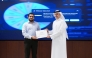 President of Kahramaa H E Eng. Abdulla bin Ali Al-Theyab presenting appreciation certificate to a participant.