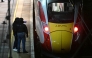 Police officers work on the platform alongside an LNER Azuma train at Huntingdon Station in Huntingdon, eastern England, on November 1, 2025, following a stabbing on a train. Photo by JUSTIN TALLIS / AFP