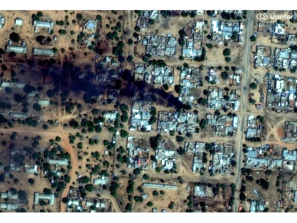 This handout satellite image by Vantor taken on October 26, 2025 and made available on October 31, 2025 shows smoke billowing from fires burning around El-Fasher Airport in El-Fasher. (Photo by Handout / Satellite image ｩ2025 Vantor / AFP)


